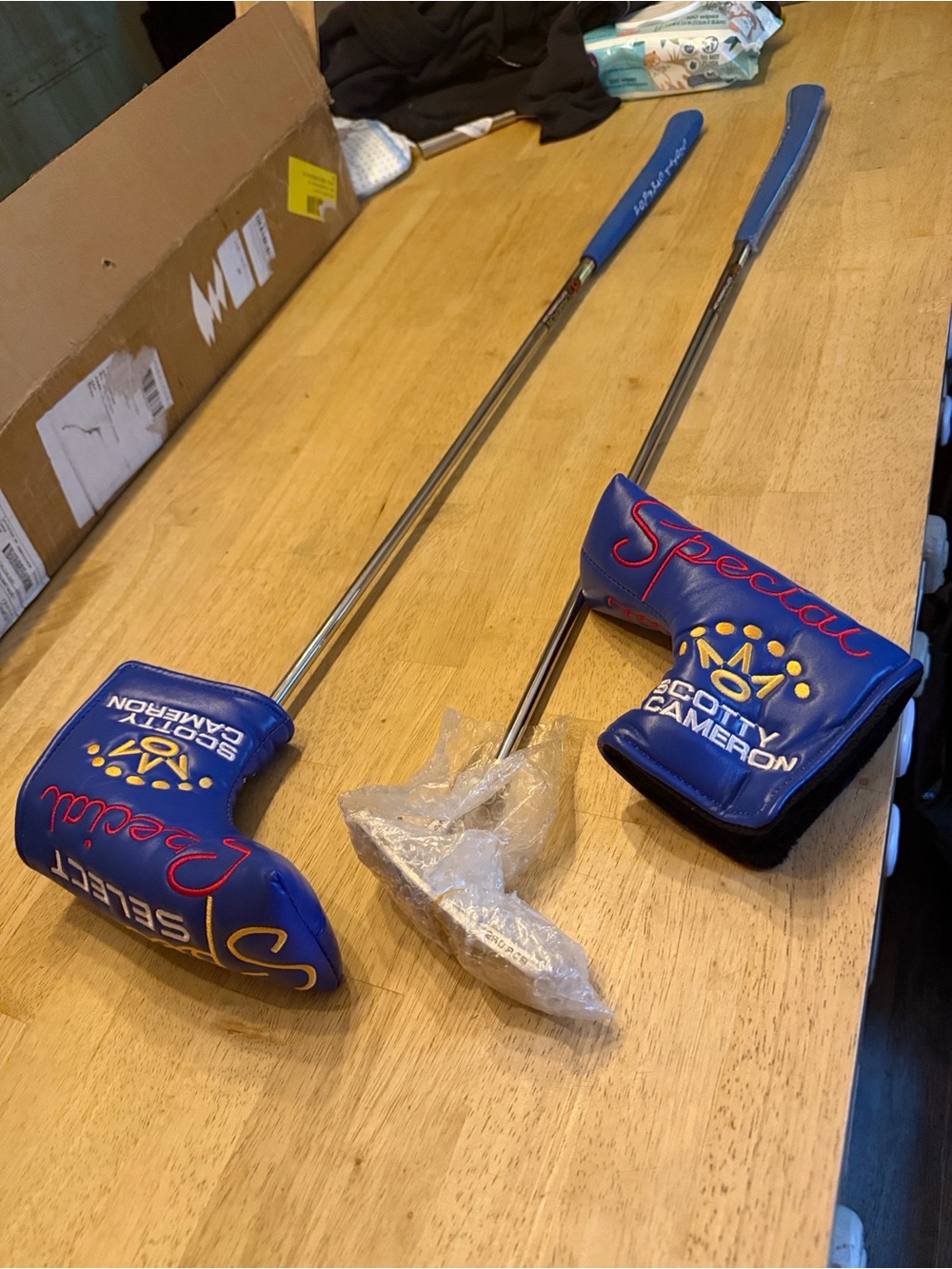 Generic Scotty Cameron Blue Putter and Headcovers with Red and Yellow Accents